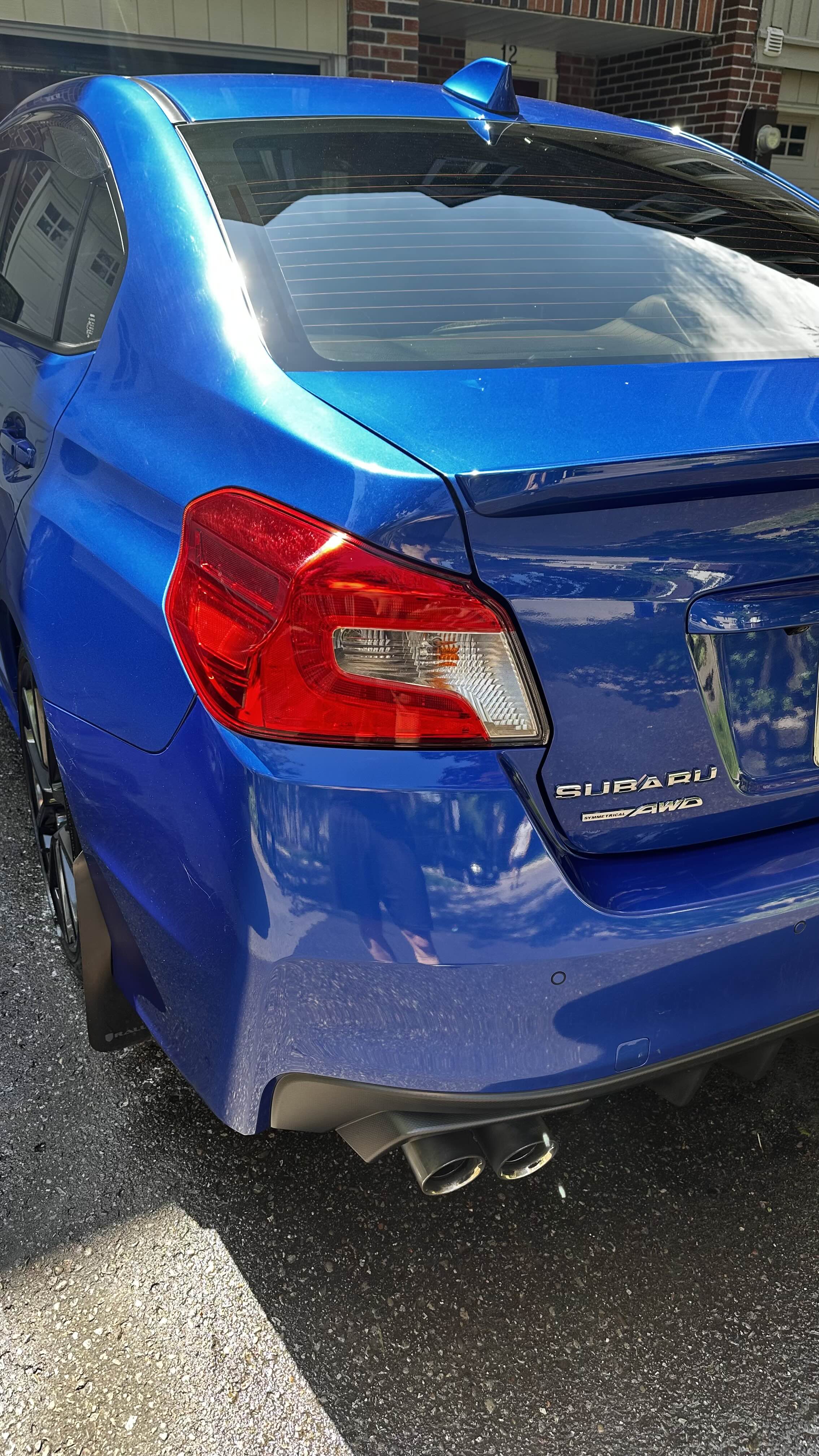Rear, badge & exhaust — after